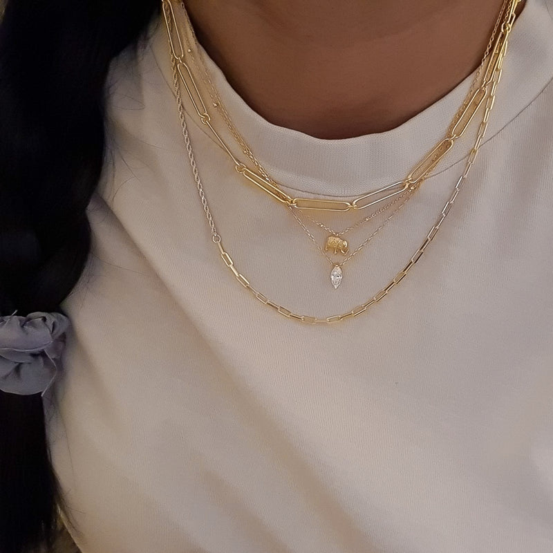 gold twist and link chain, layering chain, layering necklace, link chains, demi fine jewellery, gold vermeil chain, gold vermeil necklace gold vermeil jewellery, uk jewellery brand, gifts for her, christmas gift ideas, paperclip gold chain